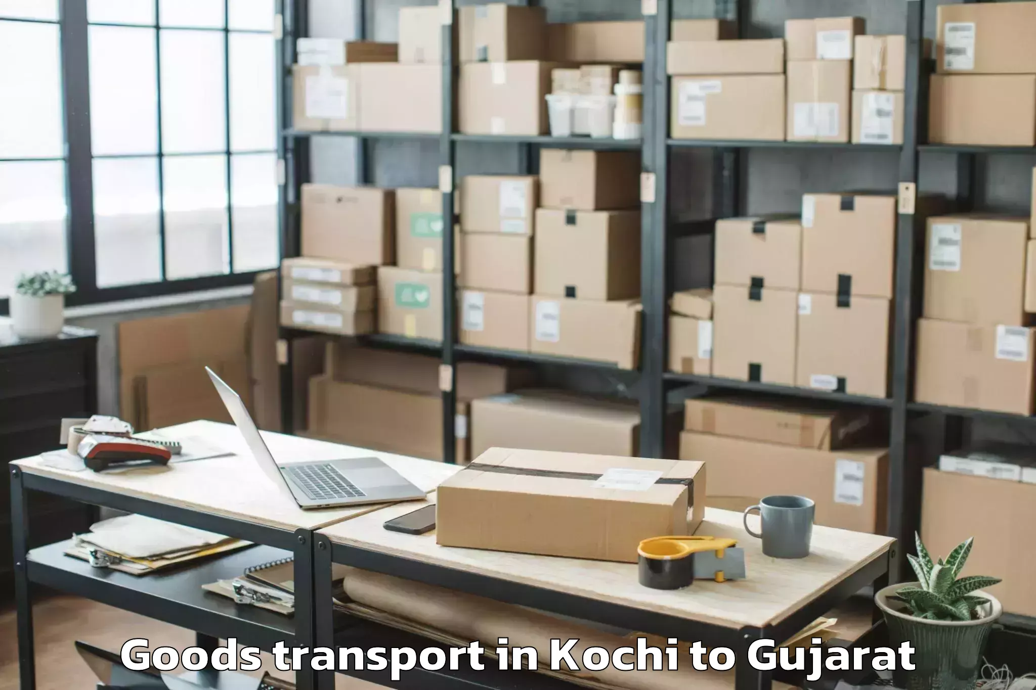 Easy Kochi to Malpur Goods Transport Booking